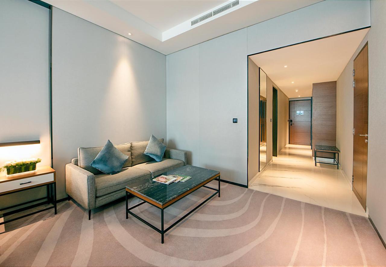 Asiana Grand Hotel Дубай Экстерьер фото A room at the hotel