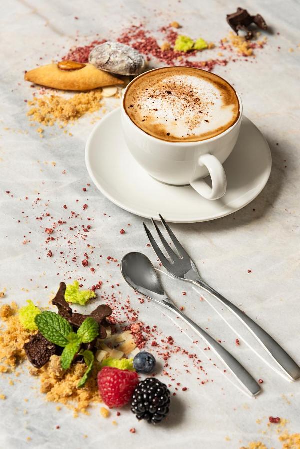 Asiana Grand Hotel Дубай Экстерьер фото A coffee cup with a saucer