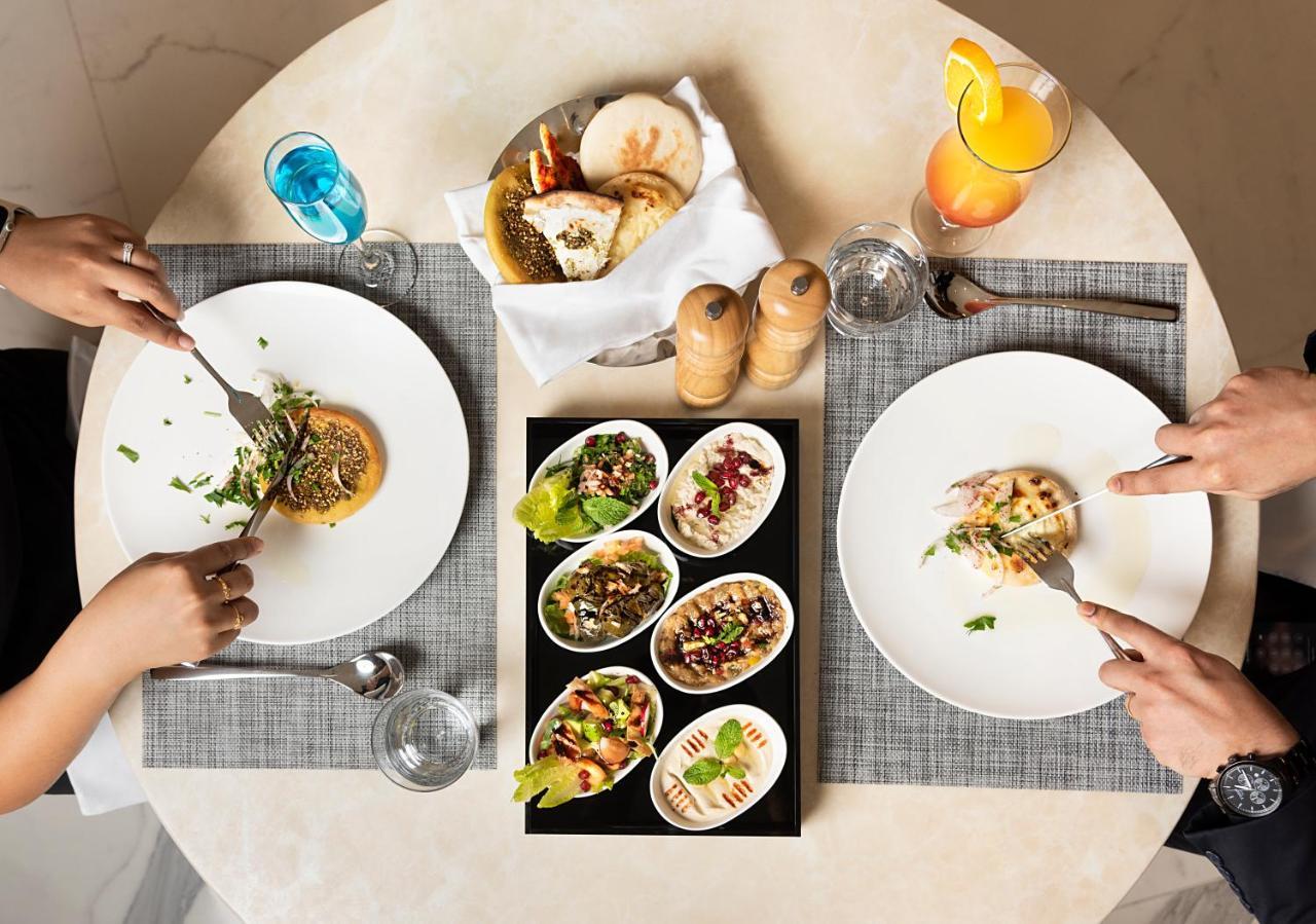Asiana Grand Hotel Дубай Экстерьер фото A selection of meze