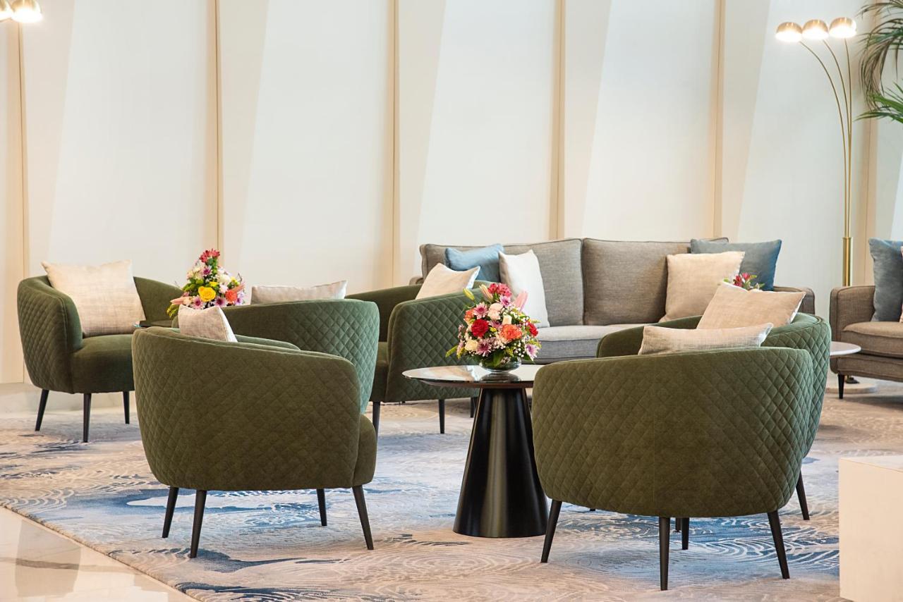Asiana Grand Hotel Дубай Экстерьер фото The lounge at the airport